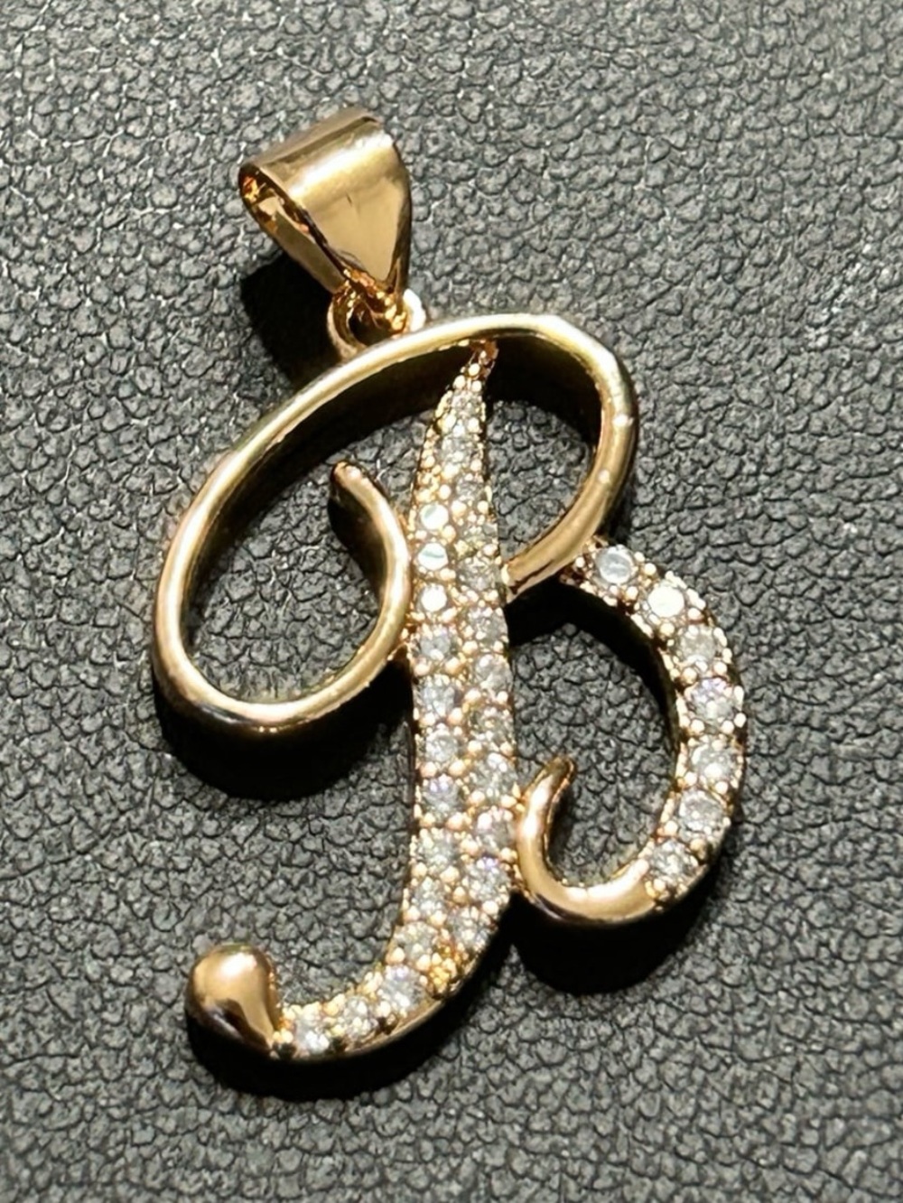 New gold “B” pendant